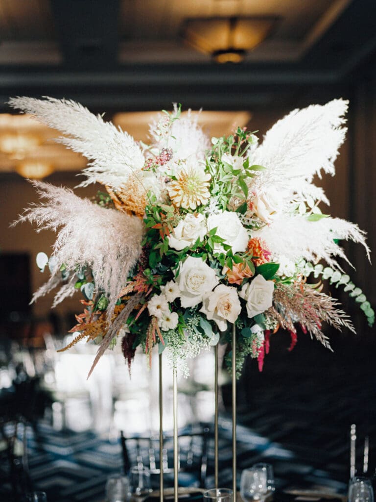 Elegant wedding reception at Everline Resort, Lake Tahoe, featuring, flowers, beautifully arranged tables and chairs for guests.