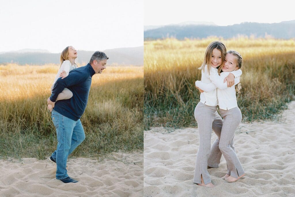 A family photo session at South Lake Tahoe features a father and his two girls in white dresses standing on the sandy shore.