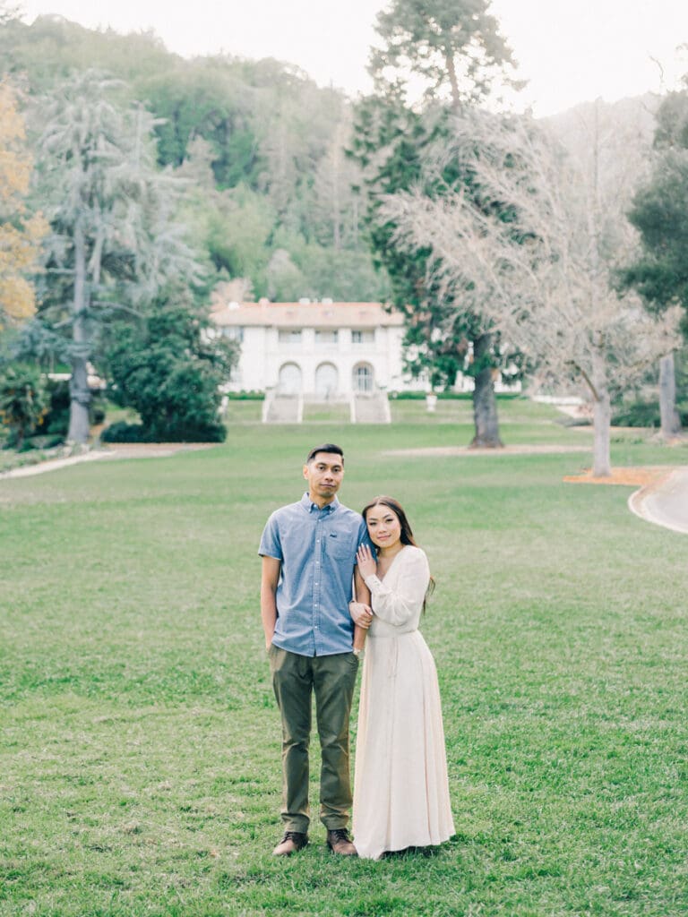 Couple posing at romantic Villa Montalvo engagement session in San Francisco, showcasing a couple's love amidst stunning landscapes.